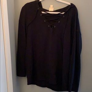 black long sleeve with cris cross design on front